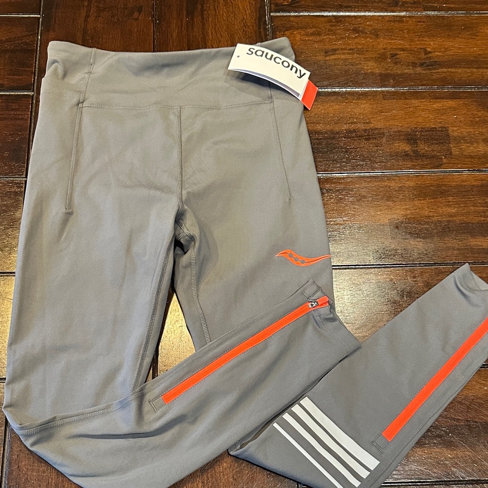 Saucony women’s running Leggings in Gray with Orange Details
